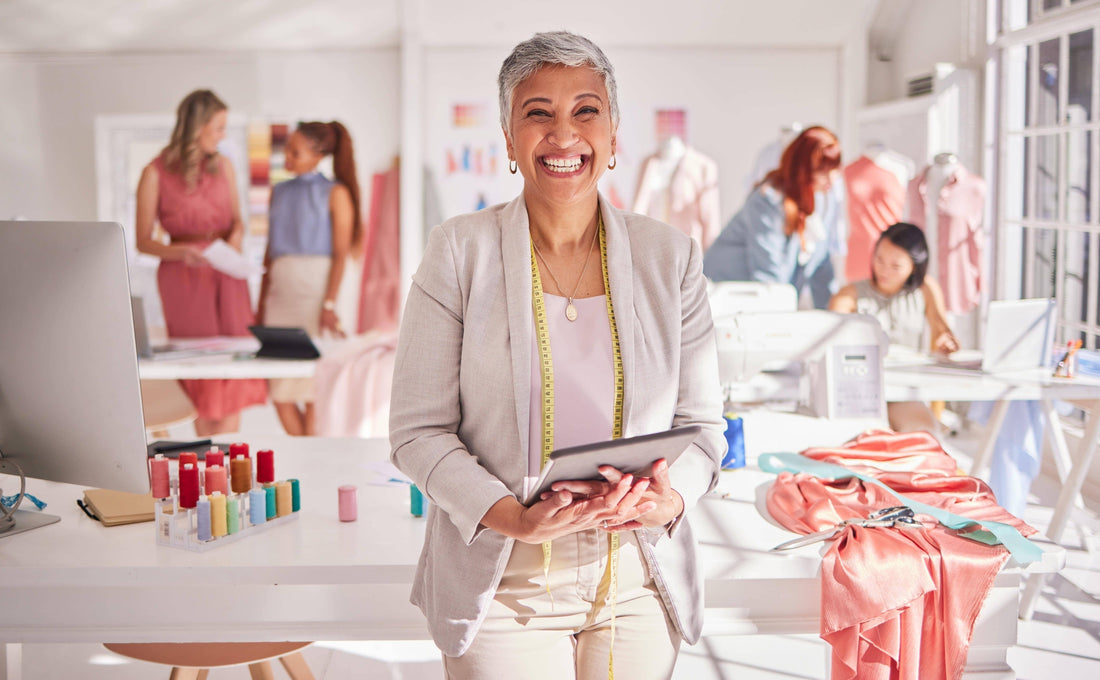 a menopausal woman smiling at the work
