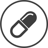 Black pill icon in a circle on a white background