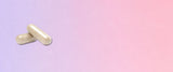 A lilac to pink gradient background with two supplement capsules to the left 