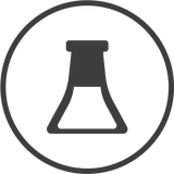 Black icon of a beaker in a circular outline on a white background